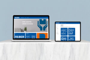 Abbildung eines Laptops mit REBER Logistik Website